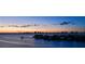 Beautiful waterfront view at sunset with city lights in the distance at 4 Belleview Blvd # 801, Belleair, FL 33756