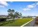 Spacious balcony overlooking lush green space and a marina at 425 150Th Ave # 2201, Madeira Beach, FL 33708