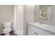 Clean bathroom features a shower, white vanity, and modern fixtures at 4508 Redcoat Dr, Wesley Chapel, FL 33543