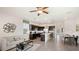 Open concept living area with kitchen, dining, and living room at 5047 Captain Davis Dr, Wimauma, FL 33598