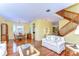 Dining room with hardwood floors, a wooden table, and built-in hutch at 5112 Twin Creeks Dr, Valrico, FL 33596