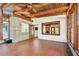 Sunroom with tile floors and a view into the kitchen area at 525 Jasmine S Way, St Petersburg, FL 33705