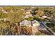 Aerial view of a house with a two-car garage and a driveway at 6301 Hobson Ne St, St Petersburg, FL 33702