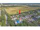 Aerial view showcasing the location of the property within the neighborhood at 6937 Exeter Park Pl, Apollo Beach, FL 33572