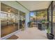 Spacious screened porch with access to the backyard, perfect for relaxing at 6937 Exeter Park Pl, Apollo Beach, FL 33572