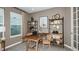 Home office featuring wooden desk, shelves, and neutral decor at 708 Sky Shade Dr, Apollo Beach, FL 33572