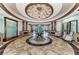 Elegant lobby with high ceilings and circular seating at 7705 Grand Estuary Trl # 206, Bradenton, FL 34212