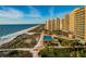 Aerial view of beachfront property with pool at 880 Mandalay Ave # C314, Clearwater Beach, FL 33767
