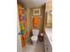 Bathroom with shower, toilet, and colorful decor at 880 Mandalay Ave # C314, Clearwater Beach, FL 33767