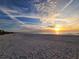 Stunning sunset view over a pristine, sandy beach at 880 Mandalay Ave # C314, Clearwater Beach, FL 33767