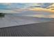 Scenic sunset over the ocean with a boardwalk in the foreground at 880 Mandalay Ave # C314, Clearwater Beach, FL 33767