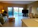 Living room with view of pool and ocean at 880 Mandalay Ave # C314, Clearwater Beach, FL 33767