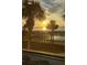 Stunning ocean view at sunrise, with pool in foreground at 880 Mandalay Ave # C314, Clearwater Beach, FL 33767