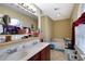 Double vanity bathroom with bathtub and large mirror at 9703 33Rd E Ave, Palmetto, FL 34221
