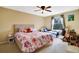 Bedroom with floral bedding and a twin bed at 9703 33Rd E Ave, Palmetto, FL 34221