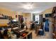 Home office or music room with a desk, computer, and musical instruments at 9703 33Rd E Ave, Palmetto, FL 34221