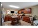 Spacious kitchen with an island, stainless steel appliances, and wood cabinets at 9703 33Rd E Ave, Palmetto, FL 34221