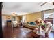 Bright and airy living room with hardwood floors at 9703 33Rd E Ave, Palmetto, FL 34221