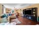 Spacious living room with hardwood floors and comfortable seating at 9703 33Rd E Ave, Palmetto, FL 34221