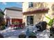 Backyard patio with seating, a grill, and a retractable awning at 9703 33Rd E Ave, Palmetto, FL 34221