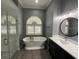 Bright bathroom with soaking tub, walk-in shower, and modern fixtures at 10101 Paddock Oaks Dr, Riverview, FL 33569