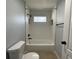 Bathroom showcasing white subway tiles in shower and neutral decor with modern fixtures and hardware at 10101 Paddock Oaks Dr, Riverview, FL 33569
