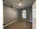Bedroom with hardwood floors, crown molding, and natural light at 10101 Paddock Oaks Dr, Riverview, FL 33569