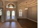 Open foyer showcasing elegant lighting, high ceilings, and a welcoming atmosphere at 10101 Paddock Oaks Dr, Riverview, FL 33569