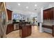 Gourmet kitchen with island, stainless steel appliances, and ample cabinet space, great for entertaining at 10101 Paddock Oaks Dr, Riverview, FL 33569