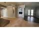 Spacious living area with tile and wood floors and an open floor plan perfect for entertaining at 10101 Paddock Oaks Dr, Riverview, FL 33569