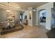 Spacious living area features neutral tones, tile floors, and an abundance of natural light at 10101 Paddock Oaks Dr, Riverview, FL 33569