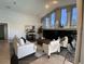 Spacious living room featuring vaulted ceilings, lots of natural light and contemporary decor at 10101 Paddock Oaks Dr, Riverview, FL 33569
