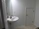 Half bathroom with white sink and tile floor at 10737 Keys Gate Dr, Riverview, FL 33579