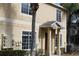 Exterior view of a two-story home with utility boxes at 10737 Keys Gate Dr, Riverview, FL 33579