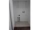 Laundry room with white walls, tiled floor, and washer/dryer hookups at 10737 Keys Gate Dr, Riverview, FL 33579