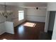 Living room with wood floors, a ceiling fan, and lots of natural light at 10737 Keys Gate Dr, Riverview, FL 33579
