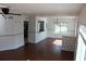 Open and airy living room with wood flooring and lots of natural light at 10737 Keys Gate Dr, Riverview, FL 33579