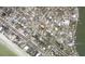 Wider aerial view showcasing the property's location within the coastal community at 15816 2Nd St E, Redington Beach, FL 33708