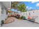 Relaxing backyard with a swing bench and small garden at 1816 Woodridge Dr, Clearwater, FL 33756