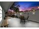 Charming backyard patio with string lights and seating area at 1816 Woodridge Dr, Clearwater, FL 33756