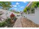 Relaxing backyard with patio, landscaping, and string lights at 1816 Woodridge Dr, Clearwater, FL 33756