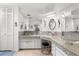 Large bathroom with granite countertops, double sinks, and ample storage at 1816 Woodridge Dr, Clearwater, FL 33756