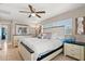 Spacious bedroom with a king-size bed and ensuite bathroom at 1816 Woodridge Dr, Clearwater, FL 33756