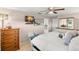 Main bedroom with king bed and access to bathroom at 1816 Woodridge Dr, Clearwater, FL 33756