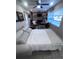 Comfortable bedroom with a sleeper sofa and fireplace at 1816 Woodridge Dr, Clearwater, FL 33756