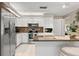 Modern kitchen with stainless steel appliances and granite counters at 1816 Woodridge Dr, Clearwater, FL 33756