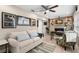 Living room with a stone fireplace and comfortable seating at 1816 Woodridge Dr, Clearwater, FL 33756