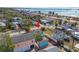 Aerial perspective of the property and surrounding neighborhood near the water at 3115 Dupont S St, Gulfport, FL 33707