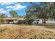 Single story home with attached carport and large yard at 3700 Dana Shores Dr, Tampa, FL 33634
