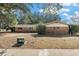 Brick ranch house with carport and mature landscaping at 3700 Dana Shores Dr, Tampa, FL 33634